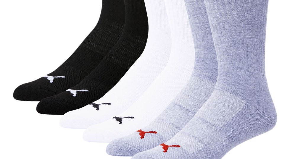 grey, white, and black pairs of puma crew socks