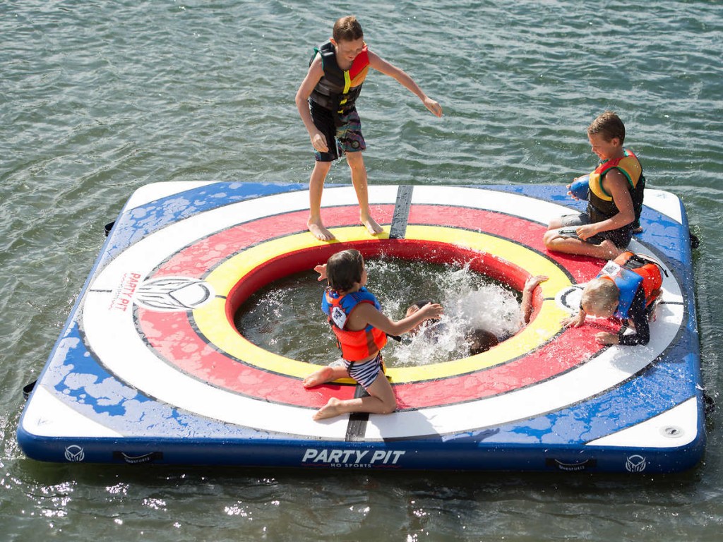 kids enjoying party pad float in lake