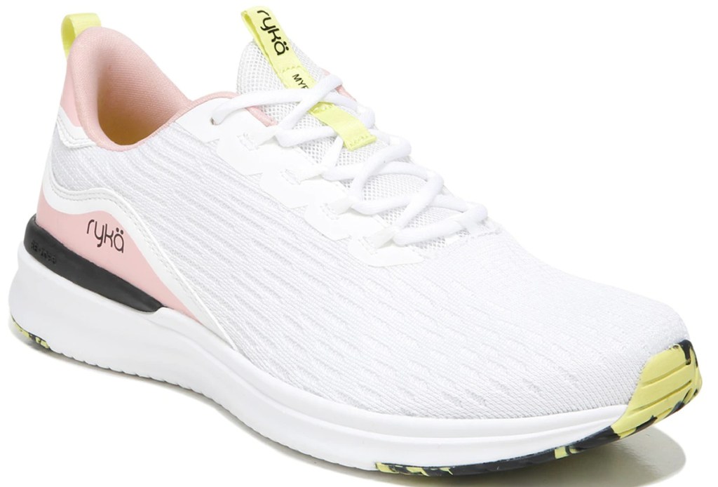 white sneakers with yellow and pink accents