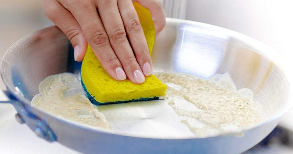 Scotch-Brite Non-Scratch Scrub Sponges being used on a pan