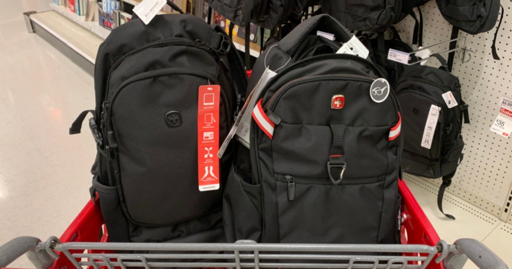 two black backpacks in cart 