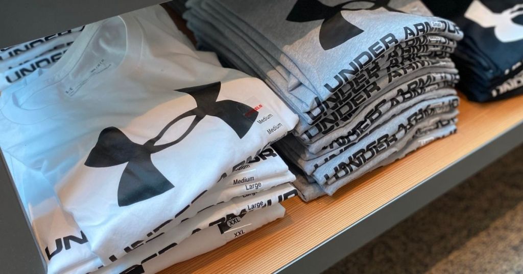 row of folded Under Armour shirts