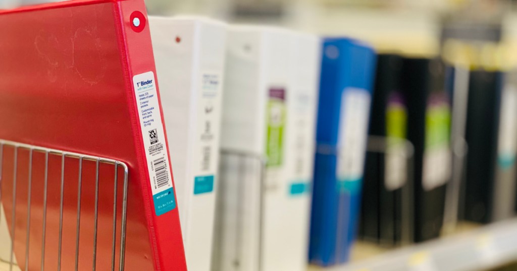 red, black, blue and white binders