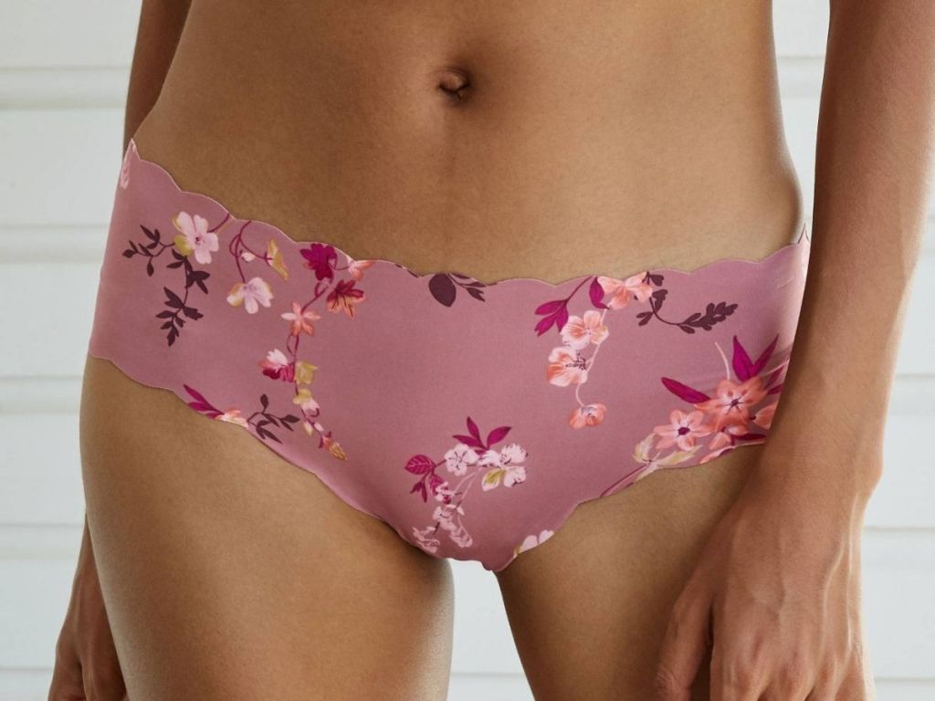 woman wearing pink floral panties
