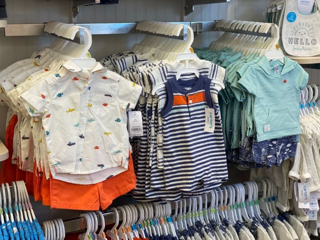 carters outfits hanging in store
