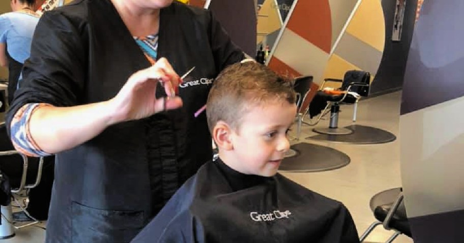 kid getting a haircut at great clips