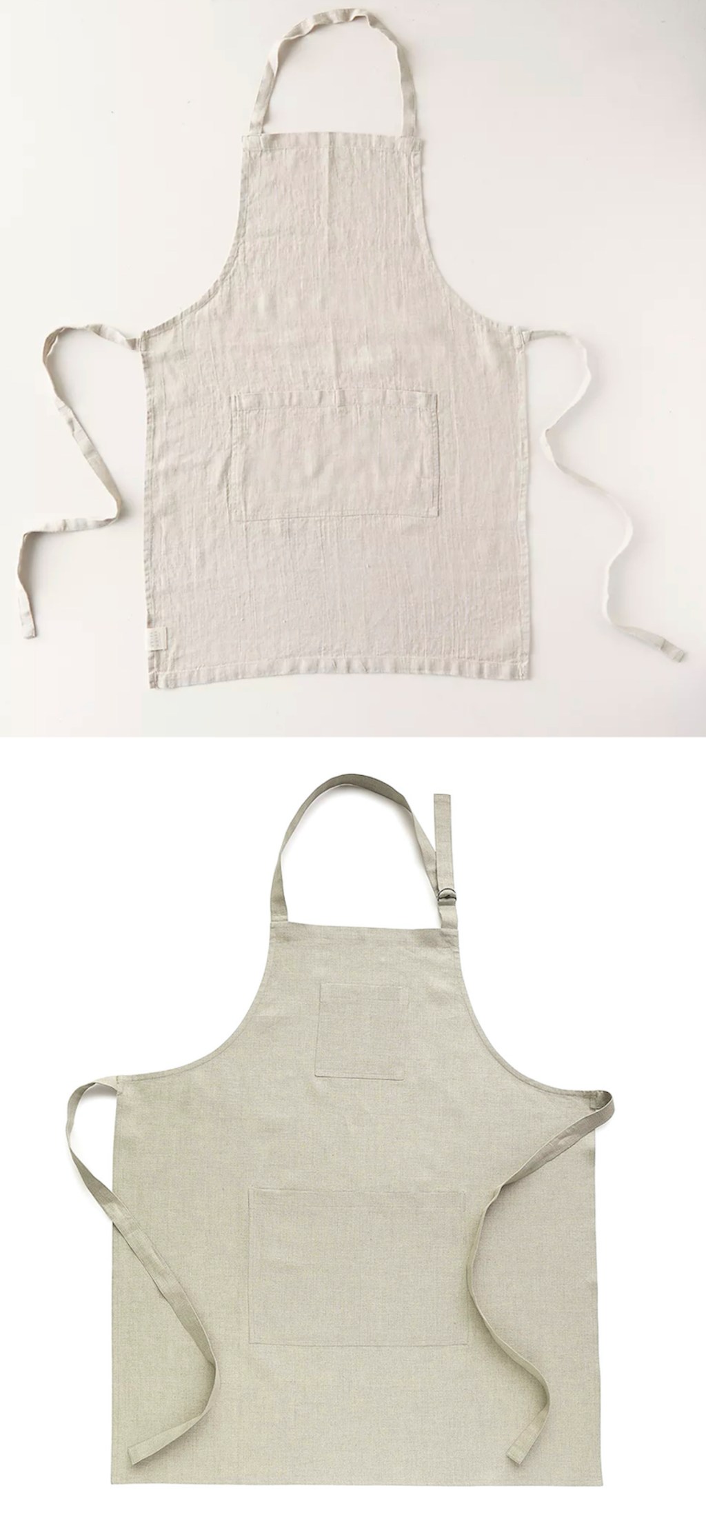 two cream colored linen aprons sitting on flat neutral white surfaces