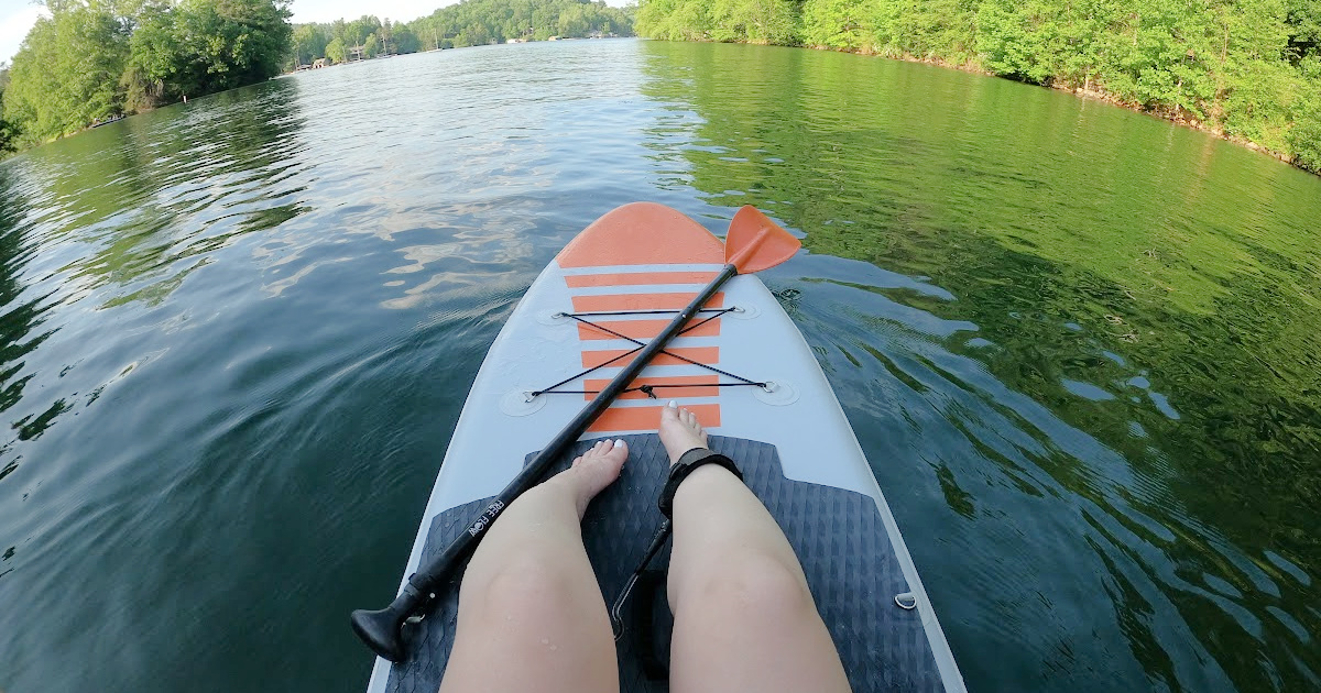 Woman's legs on paddle board
