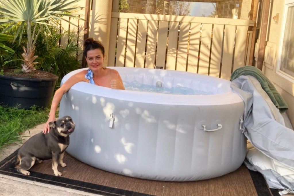 woman in saluspa inflatable hot tub