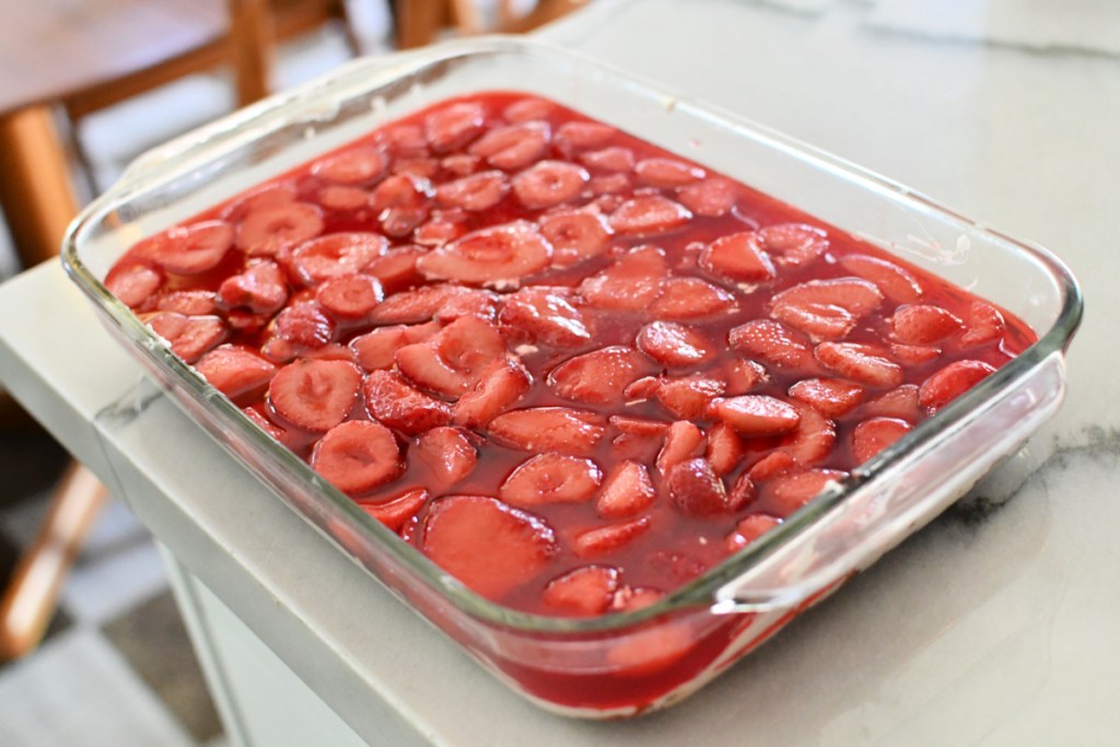strawberry pretzel salad in a pan