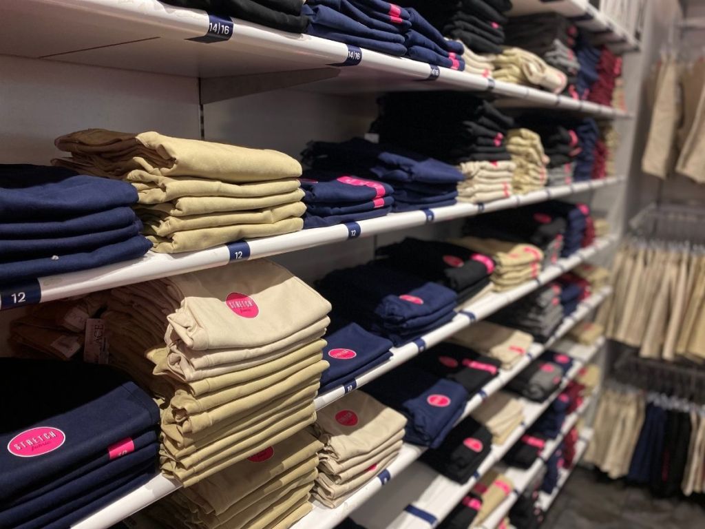 boys uniform pants on store shelf