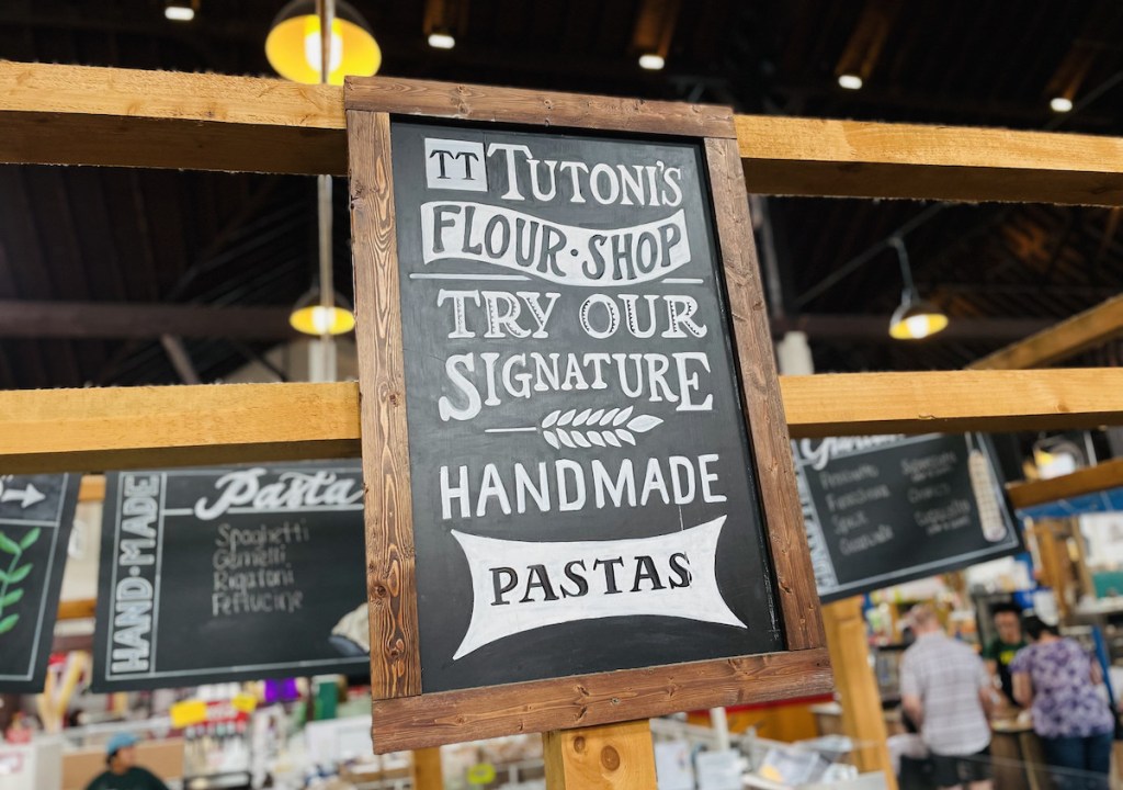 tutonis handmade flour pasta chalkboard sign in farmers market