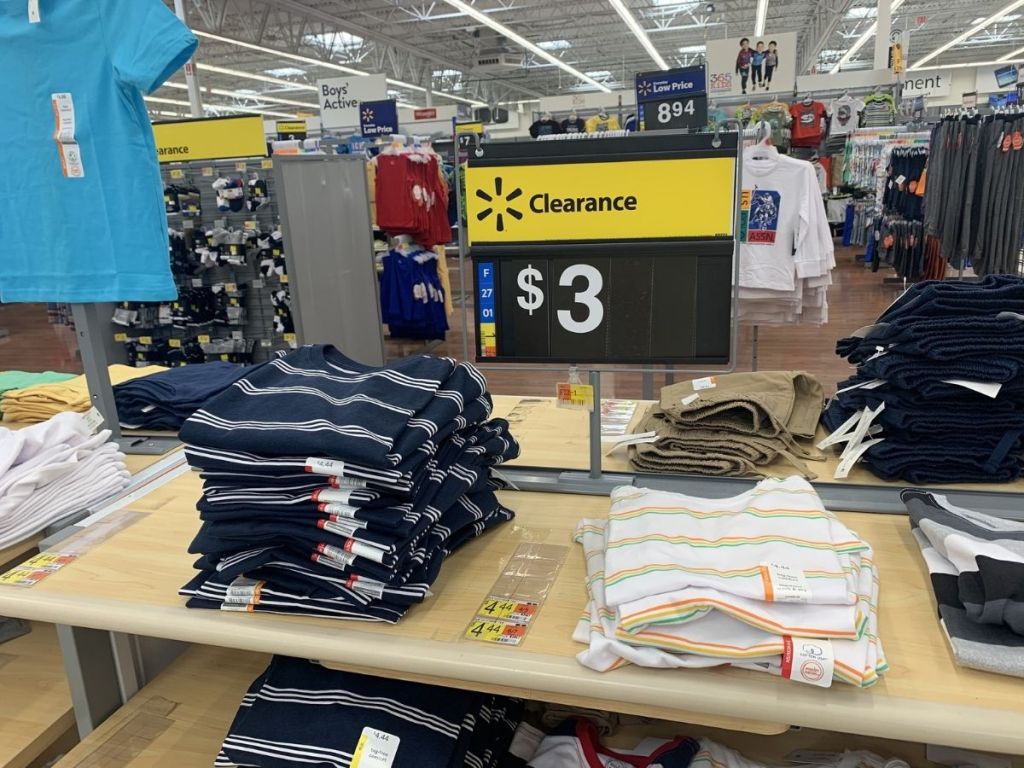 boys tees folded on clearance table in store