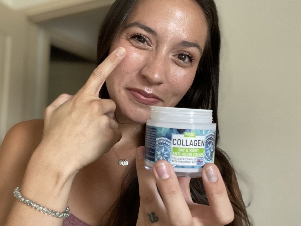 woman applying collagen face cream