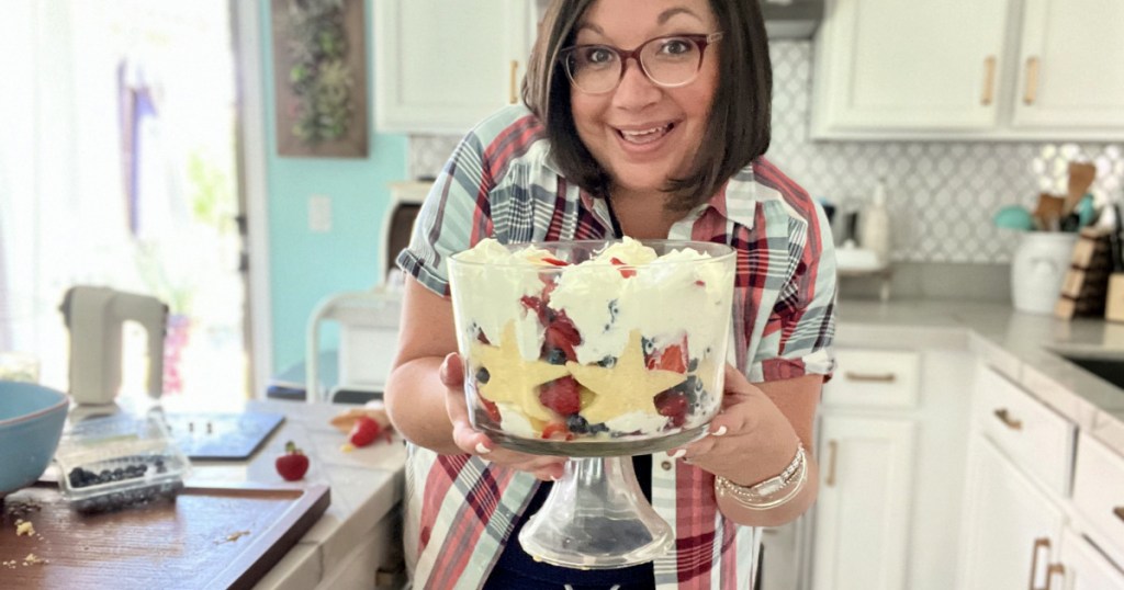 woman holding a 4th of july trifle