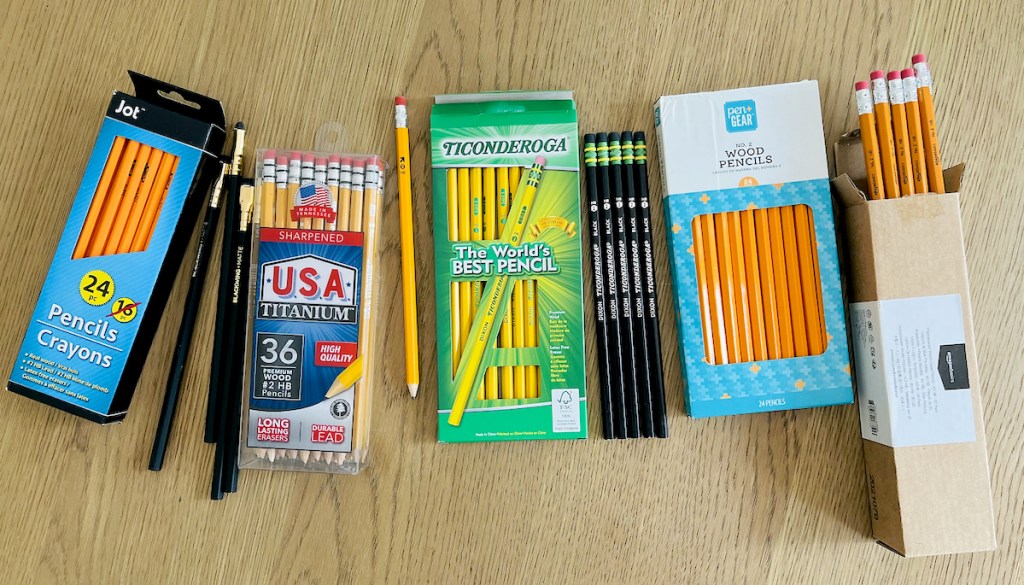 various boxes of number two pencils on wood table