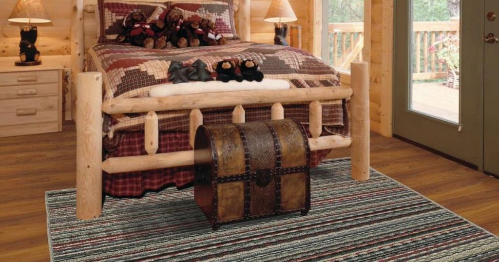 bed with a rug underneath it
