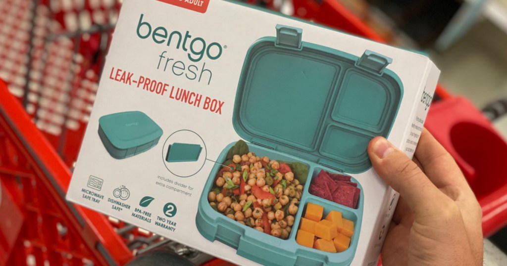hand holding teal lunch kit 
