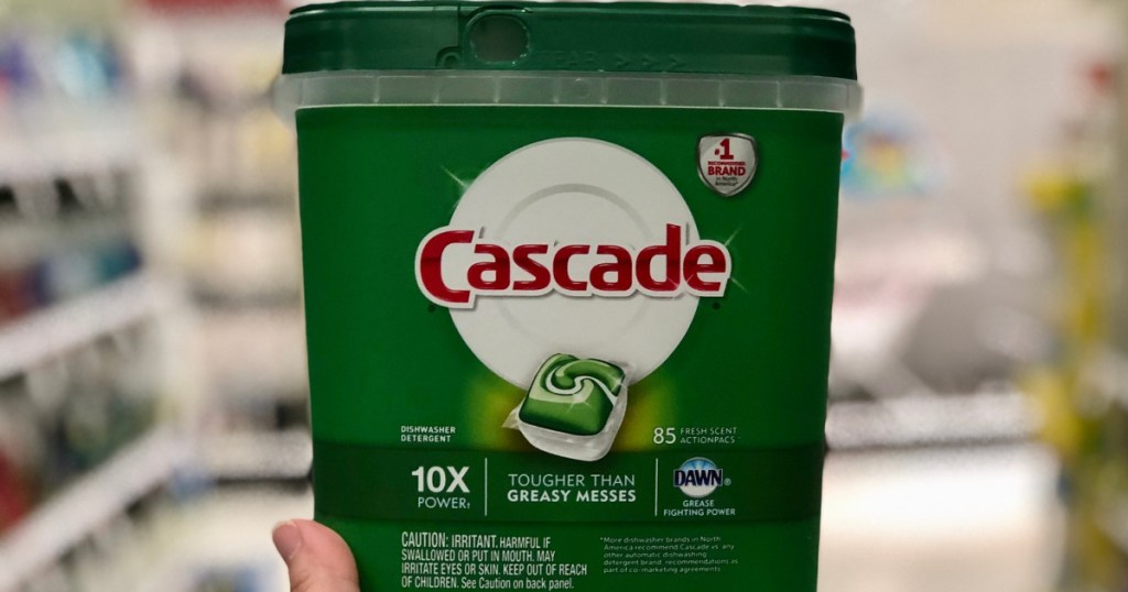 hand holding a tub of cascade complete actionpacs