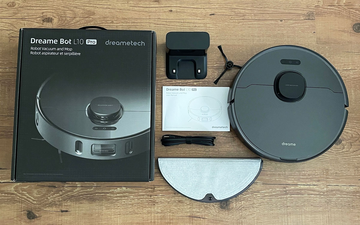 Dreametech L10 Robot Vacuum Cleaner and Mop components next to box