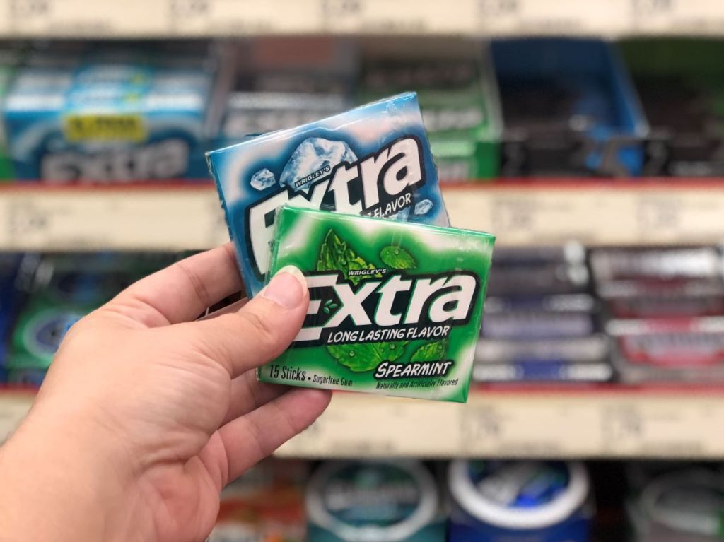 hand holding two packs of Extra gum