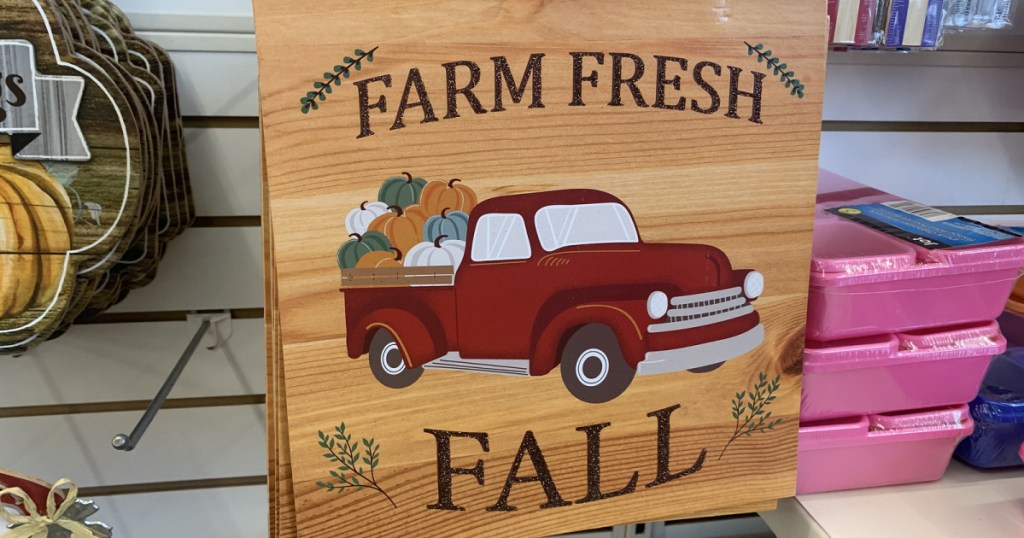 decor sign with red truck and pumpkins