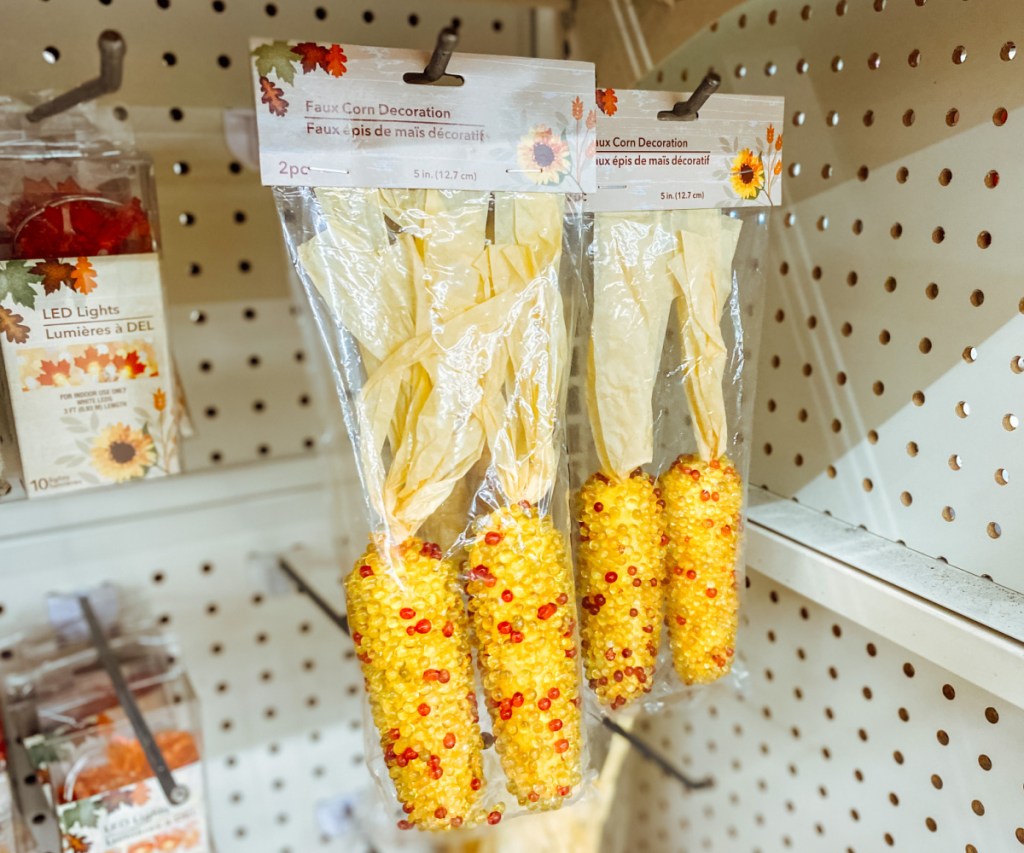 faux corn decorations packs on display in-store