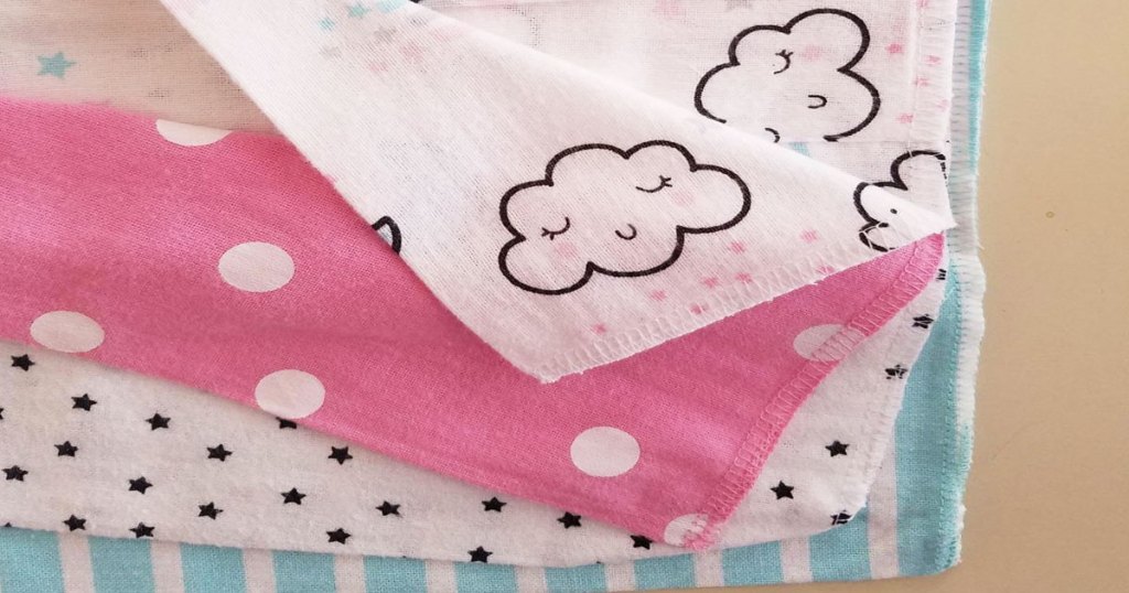 baby burb cloths with polka dots and cloud prints 