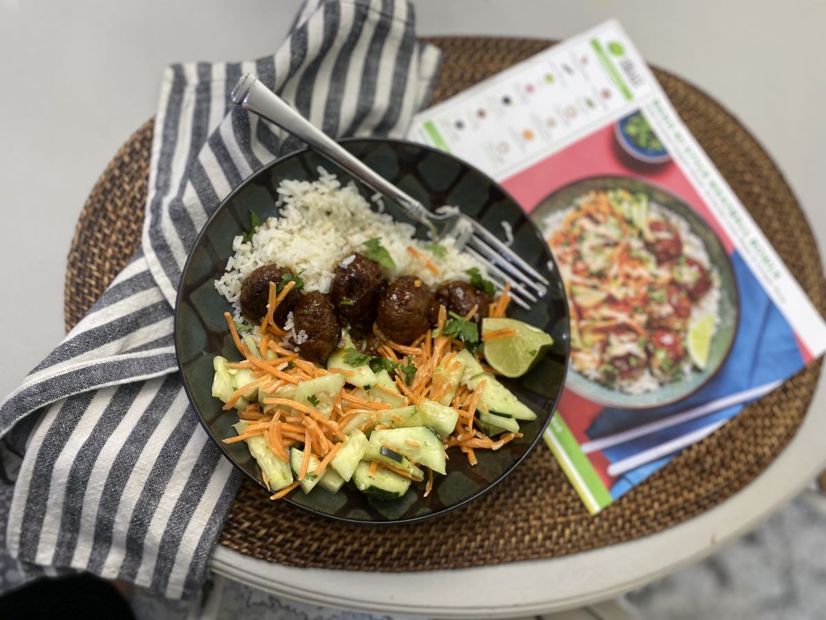 meal on a plate with a recipe next to it