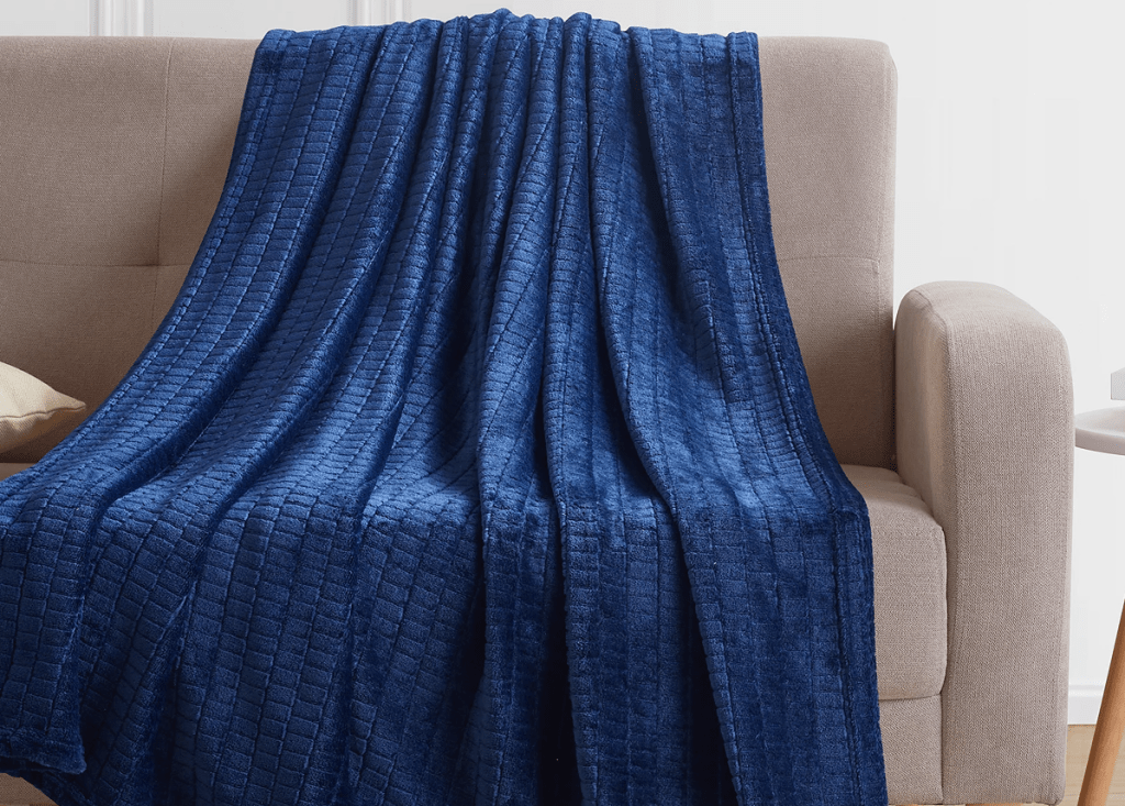 blue throw blanket on a chair