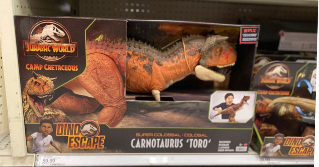 toy dinosaur on shelf 