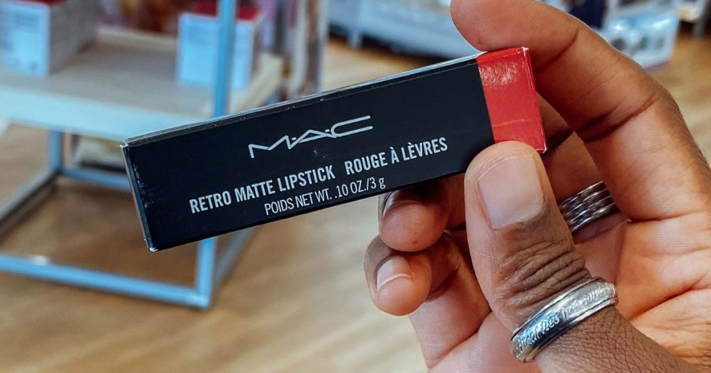 hand holding a MAC lipstick
