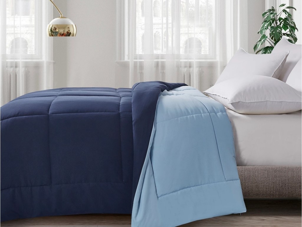blue reversible comforter on bed from macy's