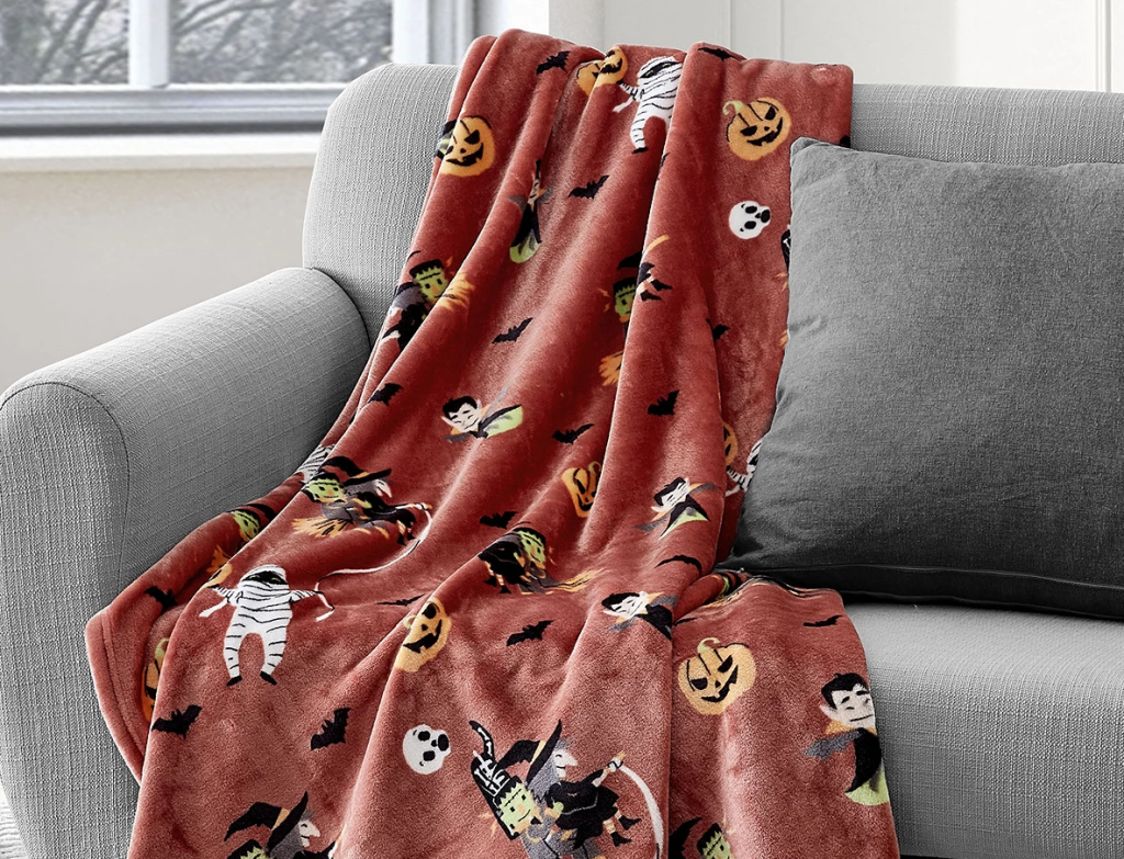 Halloween throw blanket on a couch