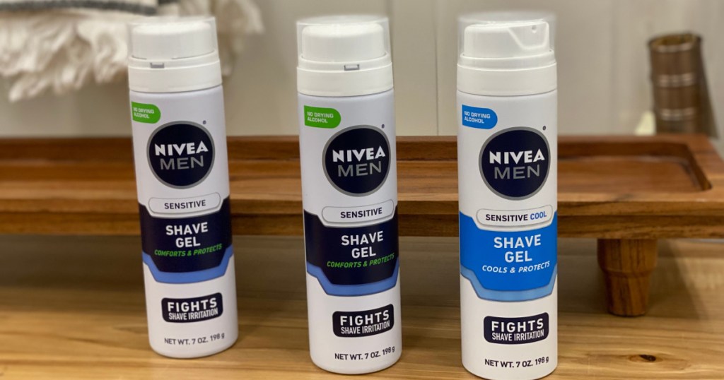 three cans of men's shave gel on table