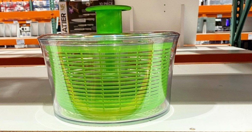 green oxo salad spinner on shelf