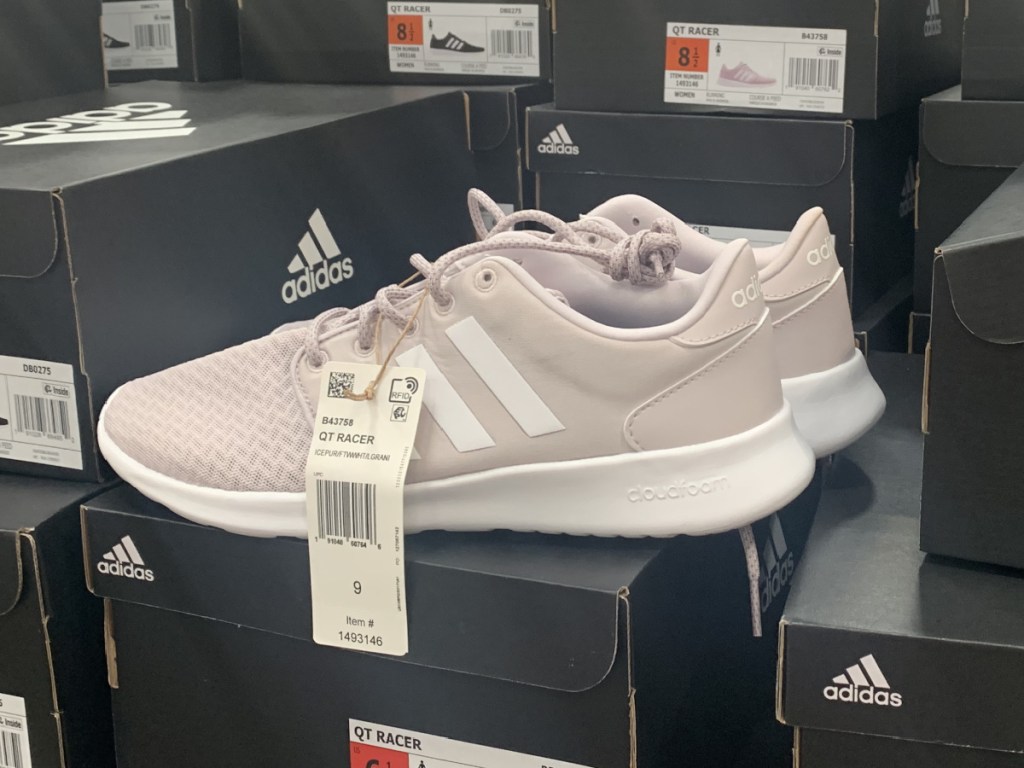 pair of pink Adidas Racer shoes inside Costco store