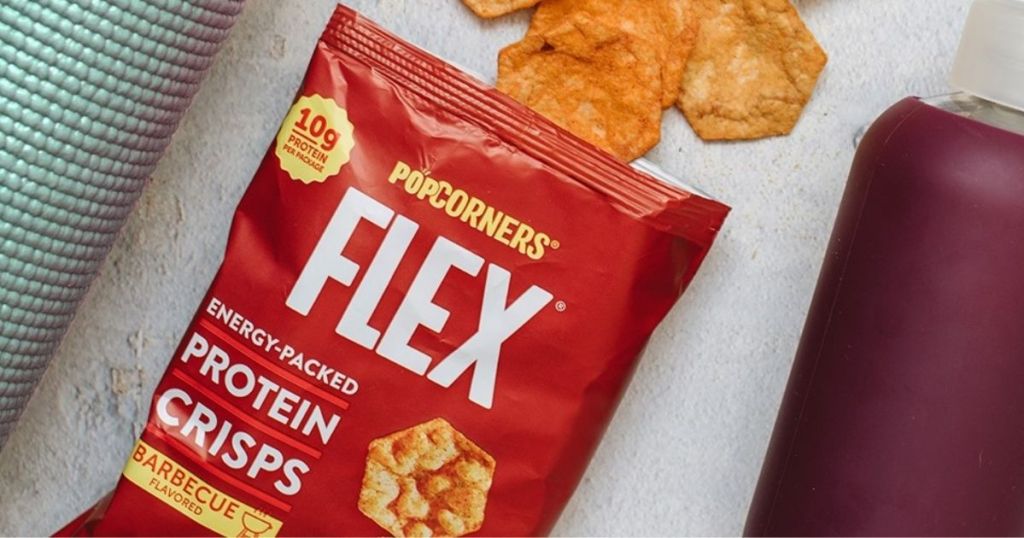 bag of Popcorners Flex BBQ Protein Chips by a water bottle