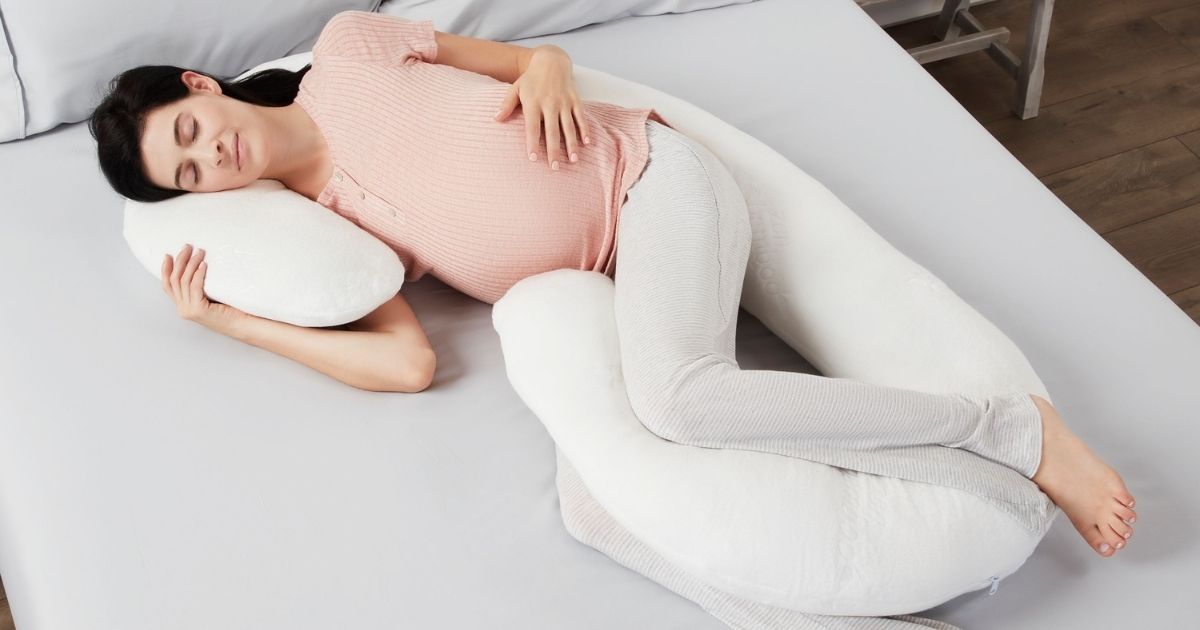 woman using a Pregnancy Pillow