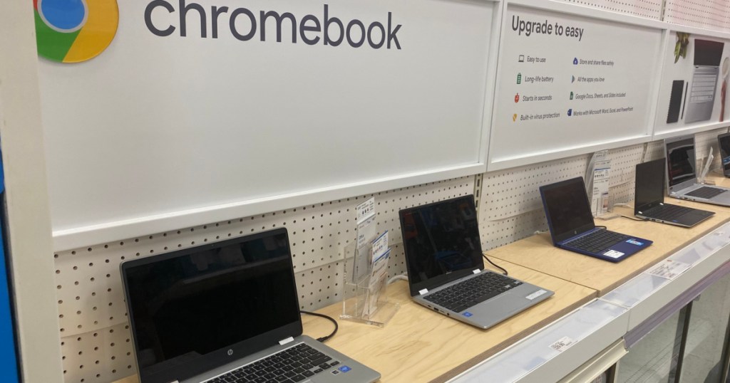 threes laptops on shelf