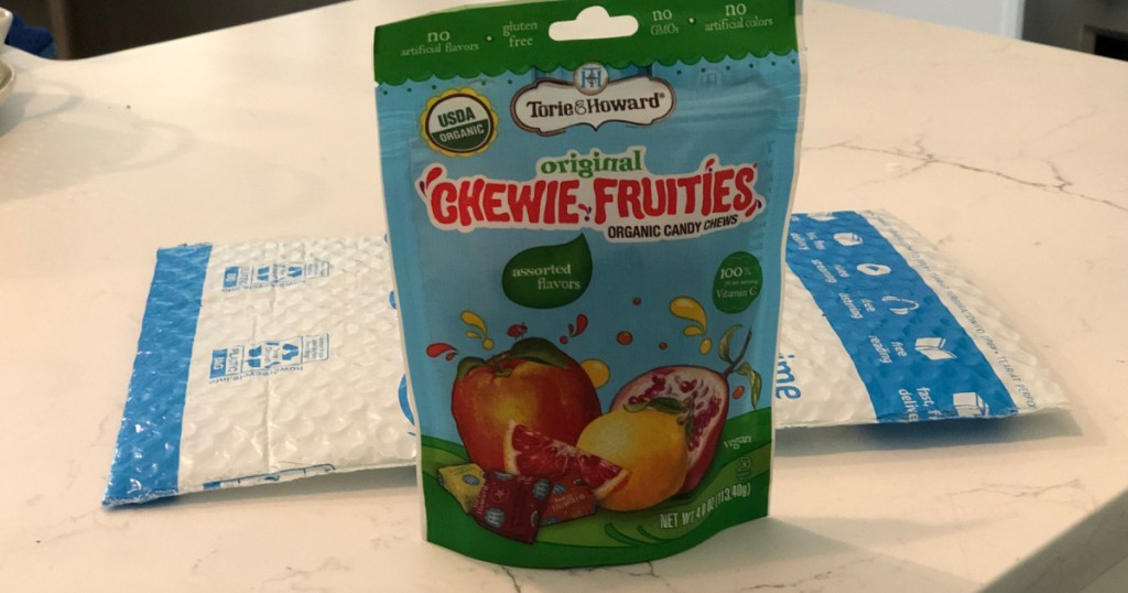 bag of Torie & Howard Chewie Fruities Organic Candy on white kitchen counter