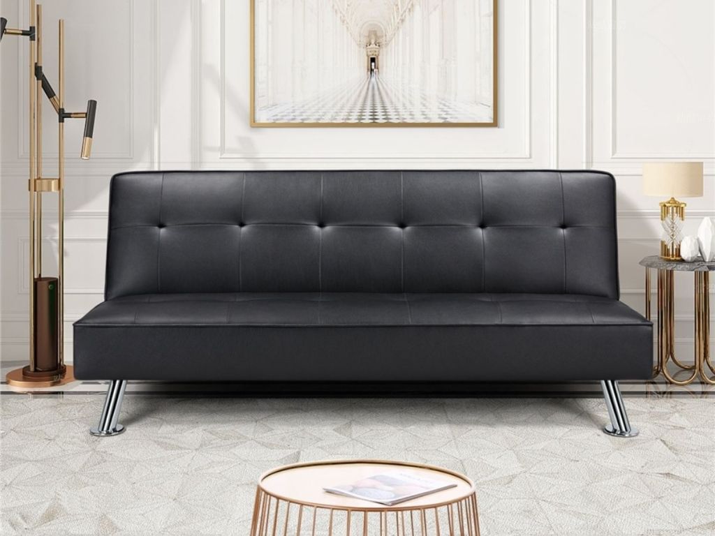 black leather futon in living room
