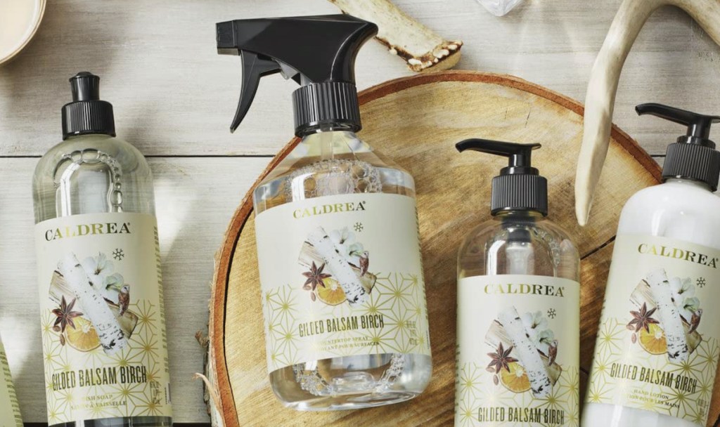 caldrea gilded balsam birch countertop spray cleaning products on wood surface