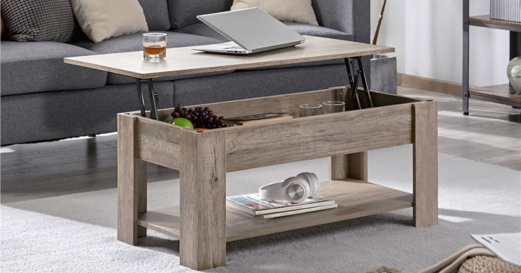 light wood finish coffee table with adjustable tabletop
