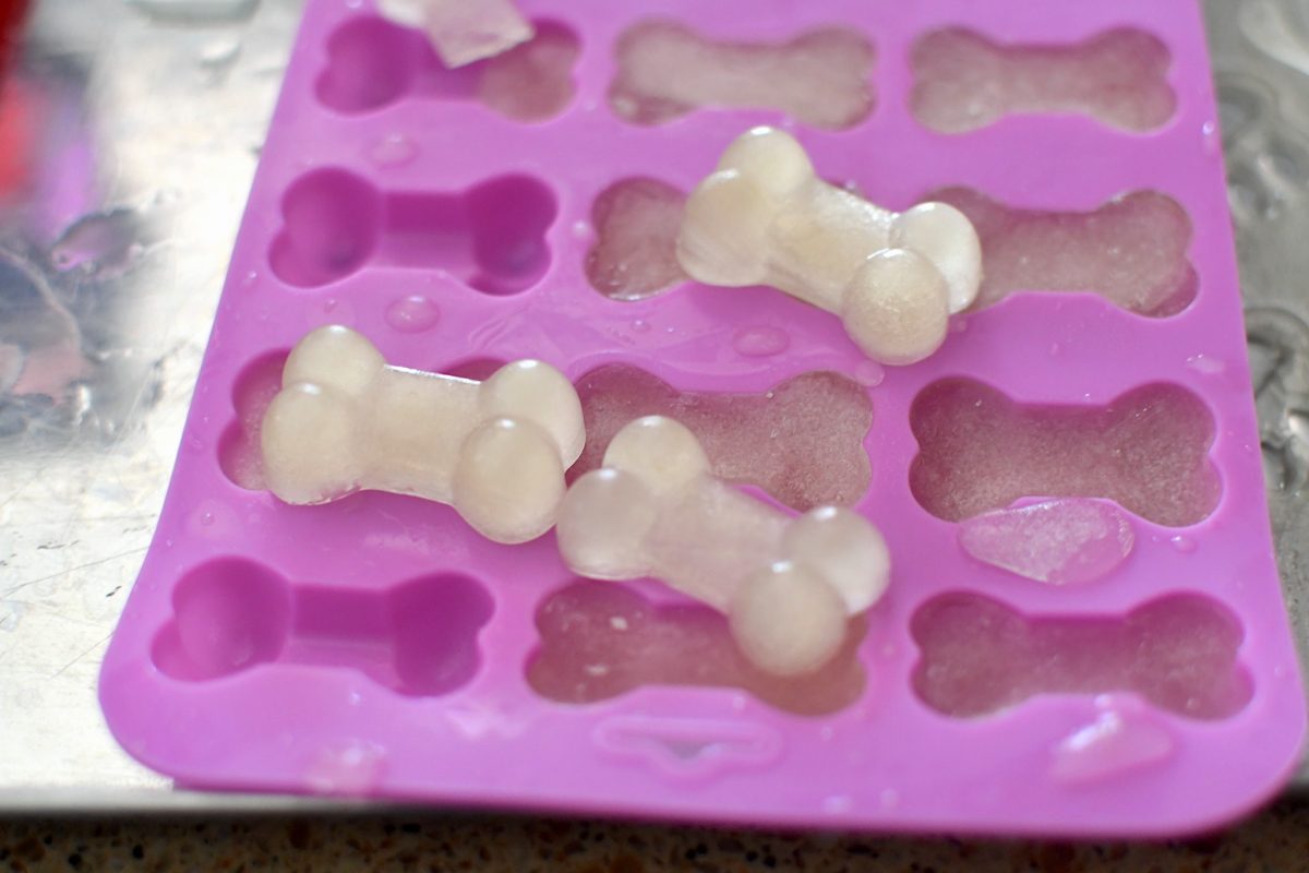 frozen dog treats coming out of silicone mold