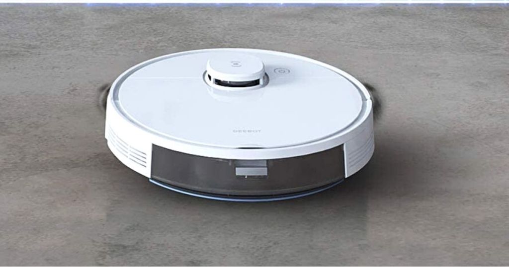 white robot vaccum on floor
