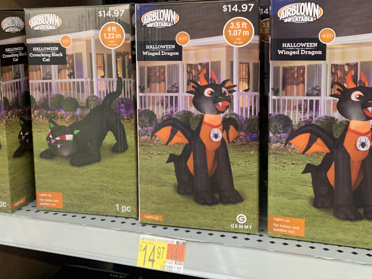 store shelf with boxes of Halloween decor