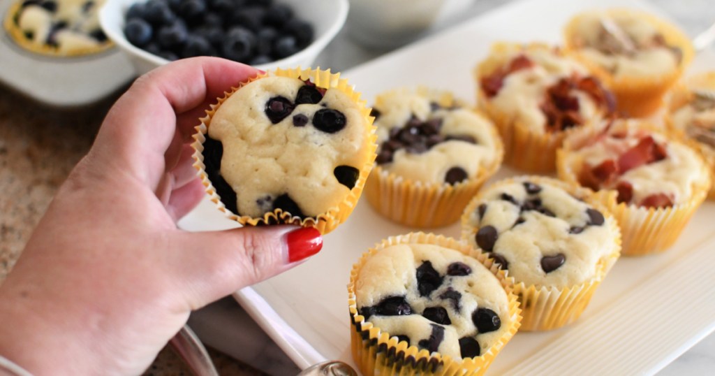 holding a blueberry pancake muffin