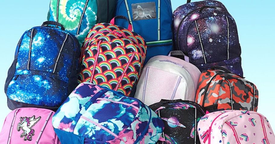 assortment of colorful backpacks