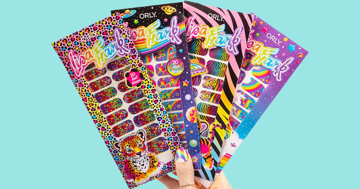hand holding Lisa Frank stickers